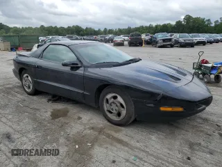 1995 Pontiac Firebird Firebird with VIN 2G2FS22S1S2215990, listed as a Copart auction lot 85984594 with 141,363 mi miles and Salvage title. Bid and sale history available at DreamBid. Image 4.