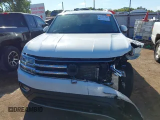 2018 Volkswagen Atlas SEL z VIN 1V2MR2CA3JC536009, wystawiony jako IAAI lot #40205798 z przebiegiem 125 945 mil mil oraz . Historia ofert i sprzedaży dostępna na DreamBid. Obrazek 6.