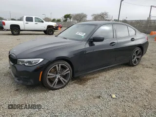 2022 BMW 3 Series 330i with VIN 3MW5R1J06N8C45380, listed as a Copart auction lot 50214105 with 49,995 mi miles and Salvage Title. Bid and sale history available at carsss.com. Image 1.