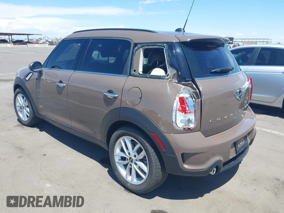 2013 MINI Countryman S ALL4 with VIN WMWZC5C54DWP34224, listed as a IAAI auction lot 42141400 with 33,307 mi miles and . Bid and sale history available at DreamBid. Image 3.