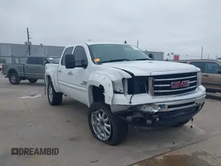 2012 GMC Sierra 1500 SLE z VIN 3GTP2VE73CG162426, wystawiony jako IAAI lot #41585442 z przebiegiem 123 388 mil mil oraz . Historia ofert i sprzedaży dostępna na DreamBid. Obrazek 1.