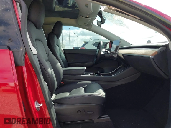 2020 Tesla Model Y Long Range with VIN 5YJYGDEE9LF009957, listed as a IAAI auction lot 41780248 with 31,053 mi miles and . Bid and sale history available at DreamBid. Image 5.