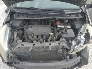 2013 Toyota Yaris L z VIN JTDJTUD33DD571231, wystawiony jako Copart lot #75826024 z przebiegiem 224 036 mil mil oraz Szkoda całkowita • Salvage title. Historia ofert i sprzedaży dostępna na DreamBid. Obrazek 11.
