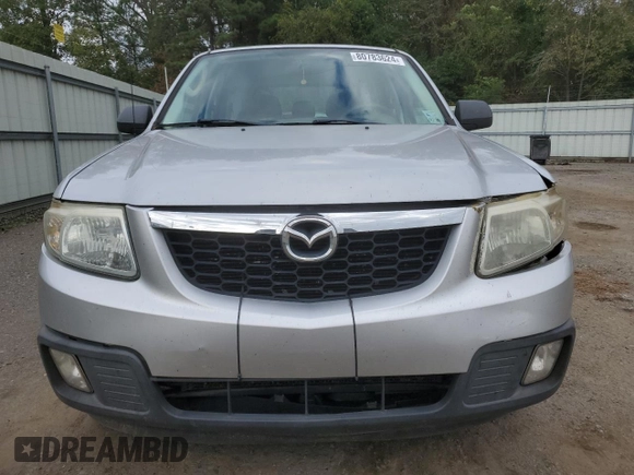 2011 Mazda Tribute Touring with VIN 4F2CY0C70BKM06723, listed as a Copart auction lot 80783624 with 218,372 mi miles and Salvage Title. Bid and sale history available at carsss.com. Image 5.
