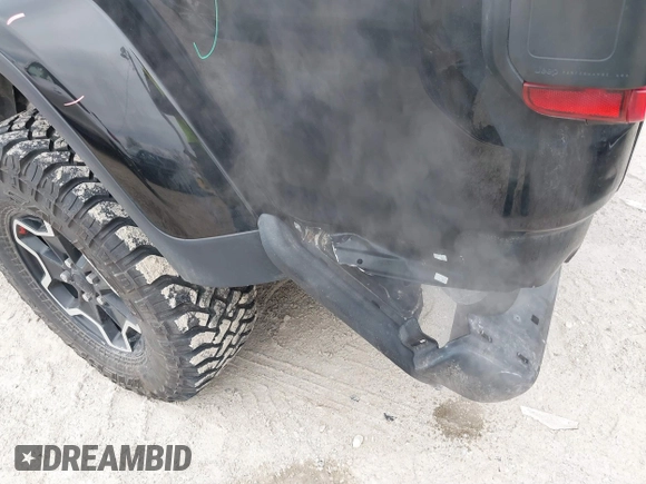 2022 Jeep Gladiator Rubicon with VIN 1C6JJTBG7NL145501, listed as a IAAI auction lot 41506842 with 20,593 mi miles and . Bid and sale history available at DreamBid. Image 6.