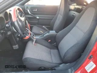 2002 Toyota MR2 z VIN JTDFR320720051674, wystawiony jako Copart lot #44495865 z przebiegiem 76 439 mil mil oraz Czysty tytuł • Clean title. Historia ofert i sprzedaży dostępna na DreamBid. Obrazek 7.