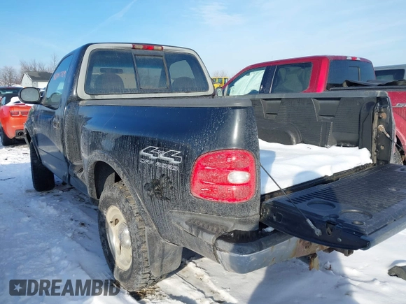 1997 Ford F-150 XL with VIN 1FTDF08W5VKD47103, listed as a IAAI auction lot 41345739 with 209,732 mi miles. Bid and sale history available at carsss.com. Image 3.