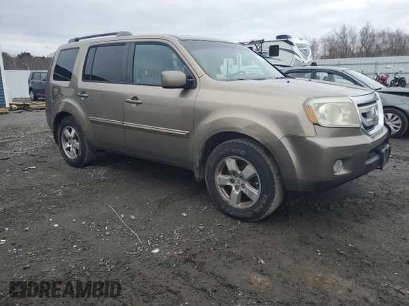 2011 Honda Pilot EX-L with VIN 5FNYF4H64BB022010, listed as a Copart auction lot 52857855 with 169,619 mi miles and Clean Title. Bid and sale history available at carsss.com. Image 4.