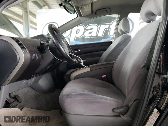2004 Toyota Prius with VIN JTDKB20U740096099, listed as a Copart auction lot 56998395 with 198,789 mi miles and Clean Title. Bid and sale history available at DreamBid. Image 7.