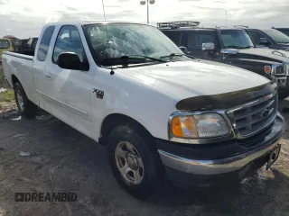 2003 Ford F-150 XL with VIN 1FTRX17L53NB90331, listed as a Copart auction lot 76686124 with 0 mi miles and Salvage Title. Bid and sale history available at carsss.com. Image 4.