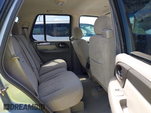 2006 GMC Envoy SLE with VIN 1GKDS13S362310613, listed as a IAAI auction lot 41881880 with 202,893 mi miles. Bid and sale history available at carsss.com. Image 8.