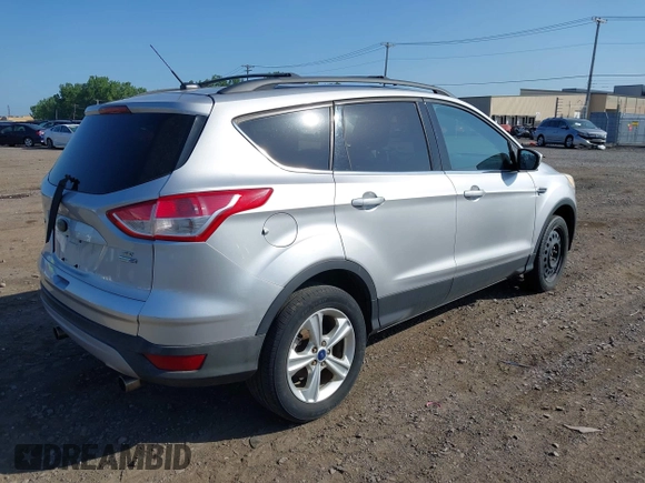 2013 Ford Escape SE with VIN 1FMCU9GX5DUD34978, listed as a IAAI auction lot 42570946 with 133,408 mi miles and . Bid and sale history available at DreamBid. Image 4.