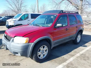 2003 Ford Escape XLT Popular 2 with VIN 1FMCU93183KC65571, listed as a IAAI auction lot 41768982 with 150,658 mi miles. Bid and sale history available at carsss.com. Image 17.