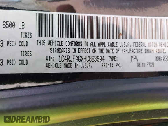 2017 Jeep Grand Cherokee Laredo with VIN 1C4RJFAGXHC863904, listed as a IAAI auction lot 41914465 with 122,981 mi miles. Bid and sale history available at carsss.com. Image 9.