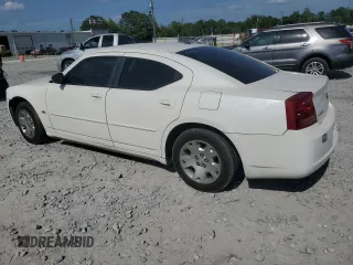 2006 Dodge Charger z VIN 2B3KA43G06H502230, wystawiony jako Copart lot #57057535 z przebiegiem 135 230 mil mil oraz Szkoda całkowita • Salvage title. Historia ofert i sprzedaży dostępna na DreamBid. Obrazek 2.