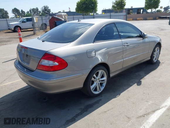 2007 Mercedes-Benz CLK-Class 3.5L with VIN WDBTJ56H47F215889, listed as a IAAI auction lot 42109563 with 106,593 mi miles. Bid and sale history available at carsss.com. Image 4.