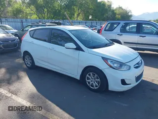 2014 Hyundai Accent GS z VIN KMHCT5AE7EU176907, wystawiony jako IAAI lot #42337936 z przebiegiem 155 667 mil mil oraz . Historia ofert i sprzedaży dostępna na DreamBid. Obrazek 1.