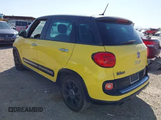 2015 FIAT 500L Urbana Trekking z VIN ZFBCFADH4FZ031650, wystawiony jako IAAI lot #42125476 z przebiegiem 43 511 mil mil oraz . Historia ofert i sprzedaży dostępna na DreamBid. Obrazek 3.