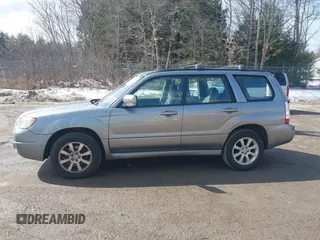 2007 Subaru Forester X w/Premium Pkg with VIN JF1SG65607H727290, listed as a IAAI auction lot 41795154 with 261,798 mi miles. Bid and sale history available at carsss.com. Image 12.