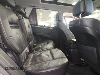 2012 BMW X5 35i z VIN 5UXZV4C58CL758466, wystawiony jako Copart lot #59799955 z przebiegiem 119 331 mil mil oraz Nie do naprawy • Non repairable. Historia ofert i sprzedaży dostępna na DreamBid. Obrazek 11.
