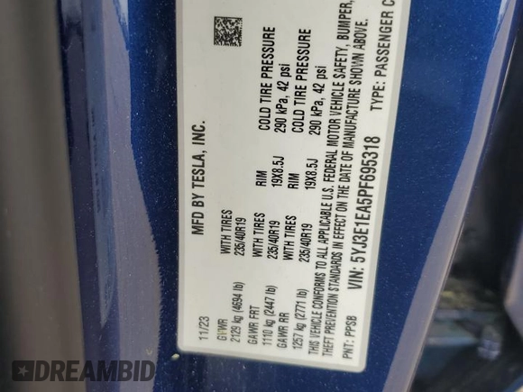 2023 Tesla Model 3 with VIN 5YJ3E1EA5PF695318, listed as a Copart auction lot 53832935 with 28,863 mi miles and Salvage title. Bid and sale history available at DreamBid. Image 12.