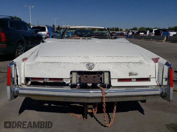 1976 Cadillac Eldorado z VIN 6L67S4Q405945, wystawiony jako Copart lot #73257834 z przebiegiem 98 761 mil mil oraz Nie do naprawy • Non repairable. Historia ofert i sprzedaży dostępna na DreamBid. Obrazek 6.