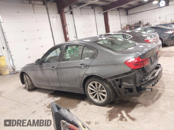 2018 BMW 3 Series 320i xDrive with VIN WBA8E5G50JNU48047, listed as a IAAI auction lot 41564022 with 69,971 mi miles. Bid and sale history available at carsss.com. Image 14.