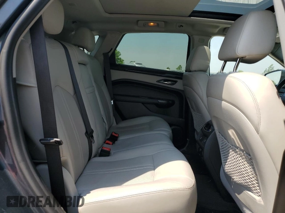 2013 Cadillac SRX Premium Collection с VIN 3GYFNJE33DS569034, выставлен на аукционе Copart как лот 60016355 с пробегом 117 595 миль миль и Чистый • Clean title. История ставок и продаж доступна на DreamBid. Изображение 11.