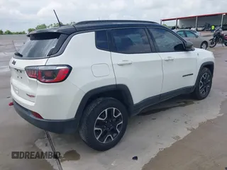 2020 Jeep Compass Trailhawk with VIN 3C4NJDDB3LT118928, listed as a IAAI auction lot 42128120 with 95,477 mi miles and . Bid and sale history available at DreamBid. Image 4.