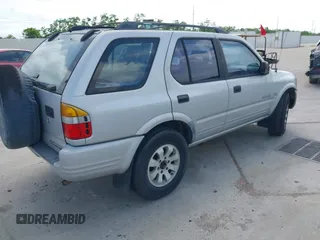 1998 Honda Passport LX z VIN 4S6CM58WXW4414530, wystawiony jako IAAI lot #42060405 z przebiegiem 175 406 mil mil oraz . Historia ofert i sprzedaży dostępna na DreamBid. Obrazek 4.