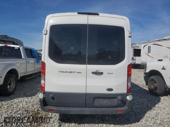 2015 Ford Transit Passenger XL with VIN 1FBAX2CM1FKB00328, listed as a Copart auction lot 43079865 with 55,851 mi miles and Salvage Title. Bid and sale history available at carsss.com. Image 6.