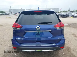 2019 Nissan Rogue SV with VIN JN8AT2MT8KW256290, listed as a IAAI auction lot 41901713 with 63,432 mi miles. Bid and sale history available at carsss.com. Image 16.