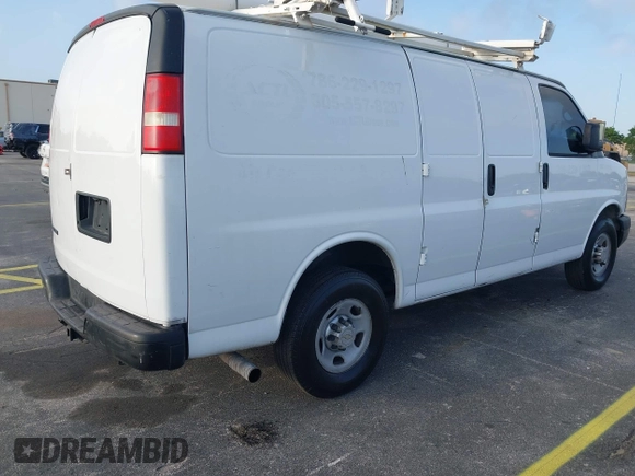 2013 Chevrolet Express Cargo with VIN 1GCWGFCG2D1144523, listed as a IAAI auction lot 41729515 with 282,755 mi miles and . Bid and sale history available at DreamBid. Image 4.