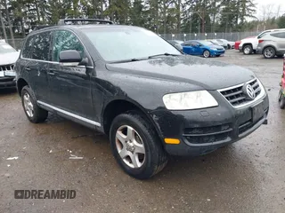 2004 Volkswagen Touareg z VIN WVGBC77L64D066183, wystawiony jako IAAI lot #41596894 z przebiegiem 148 306 mil mil oraz . Historia ofert i sprzedaży dostępna na DreamBid. Obrazek 1.