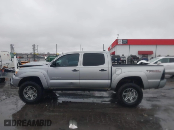 2014 Toyota Tacoma with VIN 3TMLU4EN2EM161239, listed as a IAAI auction lot 41536944 with 136,299 mi miles. Bid and sale history available at carsss.com. Image 14.