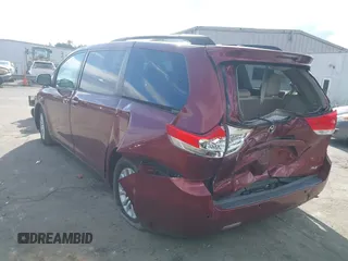 2014 Toyota Sienna XLE with VIN 5TDYK3DCXES442968, listed as a IAAI auction lot 41241310 with 132,020 mi miles and . Bid and sale history available at DreamBid. Image 3.