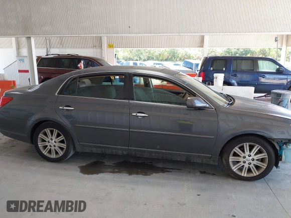 2009 Toyota Avalon XL with VIN 4T1BK36B19U348758, listed as a IAAI auction lot 39746698 with 141,454 mi miles and . Bid and sale history available at DreamBid. Image 12.