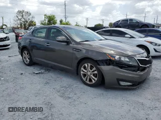 2013 Kia Optima EX z VIN 5XXGN4A72DG188821, wystawiony jako Copart lot #65546495 z przebiegiem 187 286 mil mil oraz Szkoda całkowita • Salvage title. Historia ofert i sprzedaży dostępna na DreamBid. Obrazek 4.