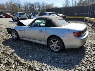 2002 Honda S2000 with VIN JHMAP11412T003822, listed as a Copart auction lot 48801985 with 122,850 mi miles and Salvage Title. Bid and sale history available at DreamBid. Image 2.
