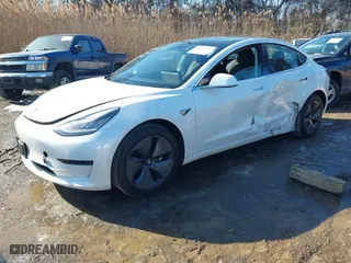 2020 Tesla Model 3 Standard Range Plus with VIN 5YJ3E1EA3LF706861, listed as a IAAI auction lot 41400754 with 85,231 mi miles. Bid and sale history available at carsss.com. Image 19.