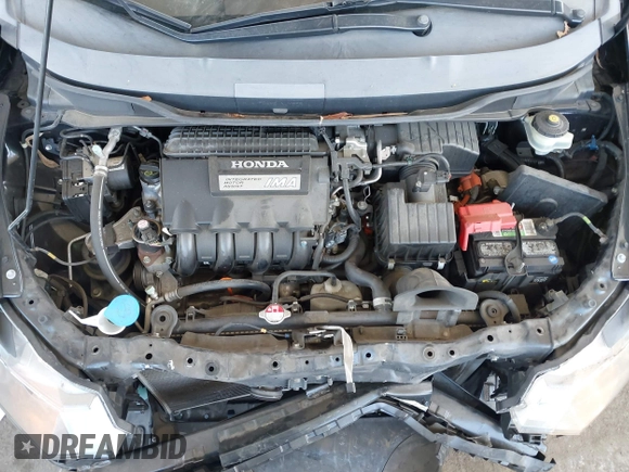 2010 Honda Insight LX with VIN JHMZE2H54AS021815, listed as a IAAI auction lot 42259951 with 137,436 mi miles and . Bid and sale history available at DreamBid. Image 10.