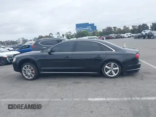 2015 Audi A8 L 4.0T with VIN WAU32AFD4FN033471, listed as a IAAI auction lot 42120112 with 174,882 mi miles. Bid and sale history available at carsss.com. Image 14.