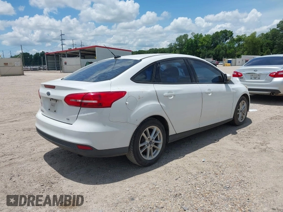 2017 Ford Focus SE z VIN 1FADP3F24HL207613, wystawiony jako IAAI lot #42596200 z przebiegiem 151 347 mil mil oraz . Historia ofert i sprzedaży dostępna na DreamBid. Obrazek 4.