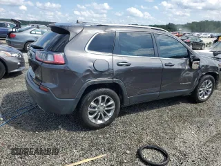 2019 Jeep Cherokee Latitude Plus with VIN 1C4PJLLN0KD119876, listed as a Copart auction lot 60462765 with 61,909 mi miles and Salvage title. Bid and sale history available at DreamBid. Image 3.