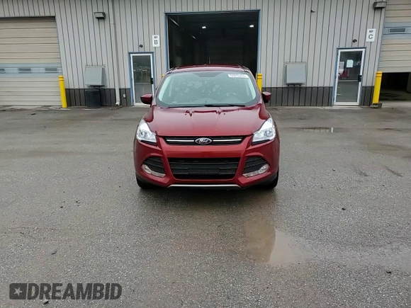 2016 Ford Escape SE with VIN 1FMCU9GX4GUA80300, listed as a Copart auction lot 52875305 with 247,537 mi miles and Salvage Title. Bid and sale history available at DreamBid. Image 14.