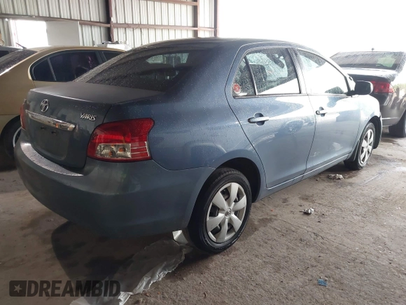 2008 Toyota Yaris with VIN JTDBT923181255807, listed as a IAAI auction lot 41923214 with 128,820 mi miles. Bid and sale history available at carsss.com. Image 4.