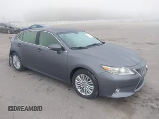 2014 Lexus ES 330 z VIN JTHBK1GGXE2148484, wystawiony jako IAAI lot #42186766 z przebiegiem 117 217 mil mil oraz . Historia ofert i sprzedaży dostępna na DreamBid. Obrazek 1.