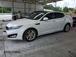 2013 Kia Optima EX с VIN 5XXGN4A76DG255260, выставлен на аукционе Copart как лот 61204525 с пробегом 167 921 миль миль и Списание • Salvage title. История ставок и продаж доступна на DreamBid. Изображение 1.