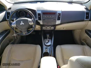 2010 Mitsubishi Outlander XLS with VIN JA4JT4AX8AZ006392, listed as a Copart auction lot 50663555 with 104,172 mi miles and Salvage Title. Bid and sale history available at carsss.com. Image 8.