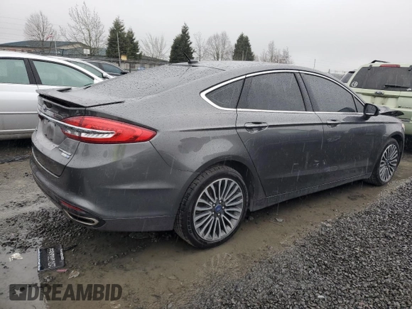 2018 Ford Fusion Titanium with VIN 3FA6P0D92JR193919, listed as a Copart auction lot 42188094 with 99,939 mi miles and Salvage title. Bid and sale history available at DreamBid. Image 3.